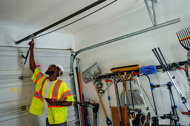 Professional Garage Door Panel Replacement technician working in Mora County County, NM